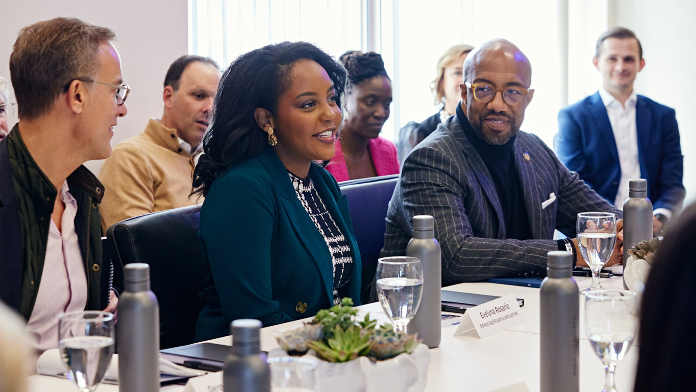 Evelyna Rosario, a Paul Quinn College alumna and current JPMorgan Chase team member, meets with JPMorgan Chase leaders including Demetrios Marantis, Global Head of Corporate Responsibility.